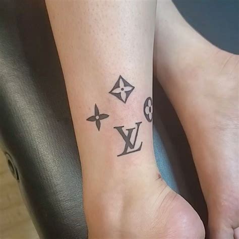 louis vuitton flower tattoo|Louis Vuitton tattoo on ankle.